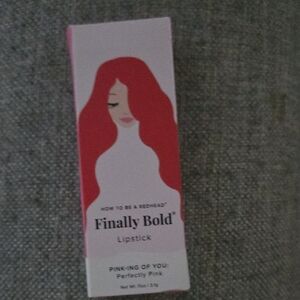 red head pink lipstick